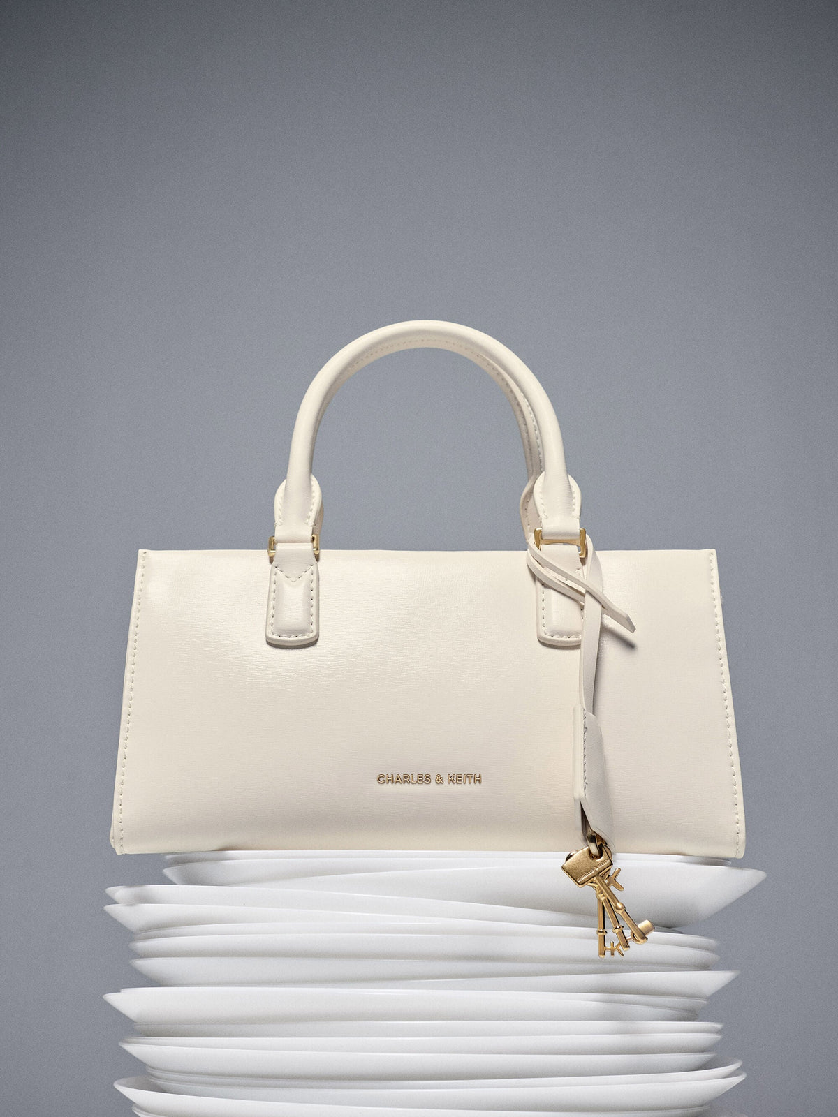 CHARLES & KEITH Customer Favorite / Kerry Top Handle Bag - Cream