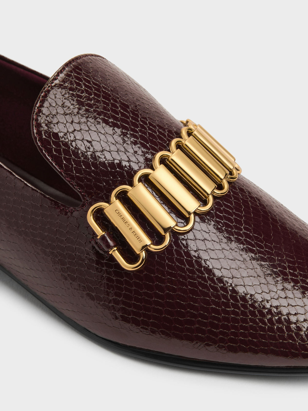 CHARLES & KEITH Premium / Snake-Print Metallic-Accent Loafers - Animal Print Burgundy