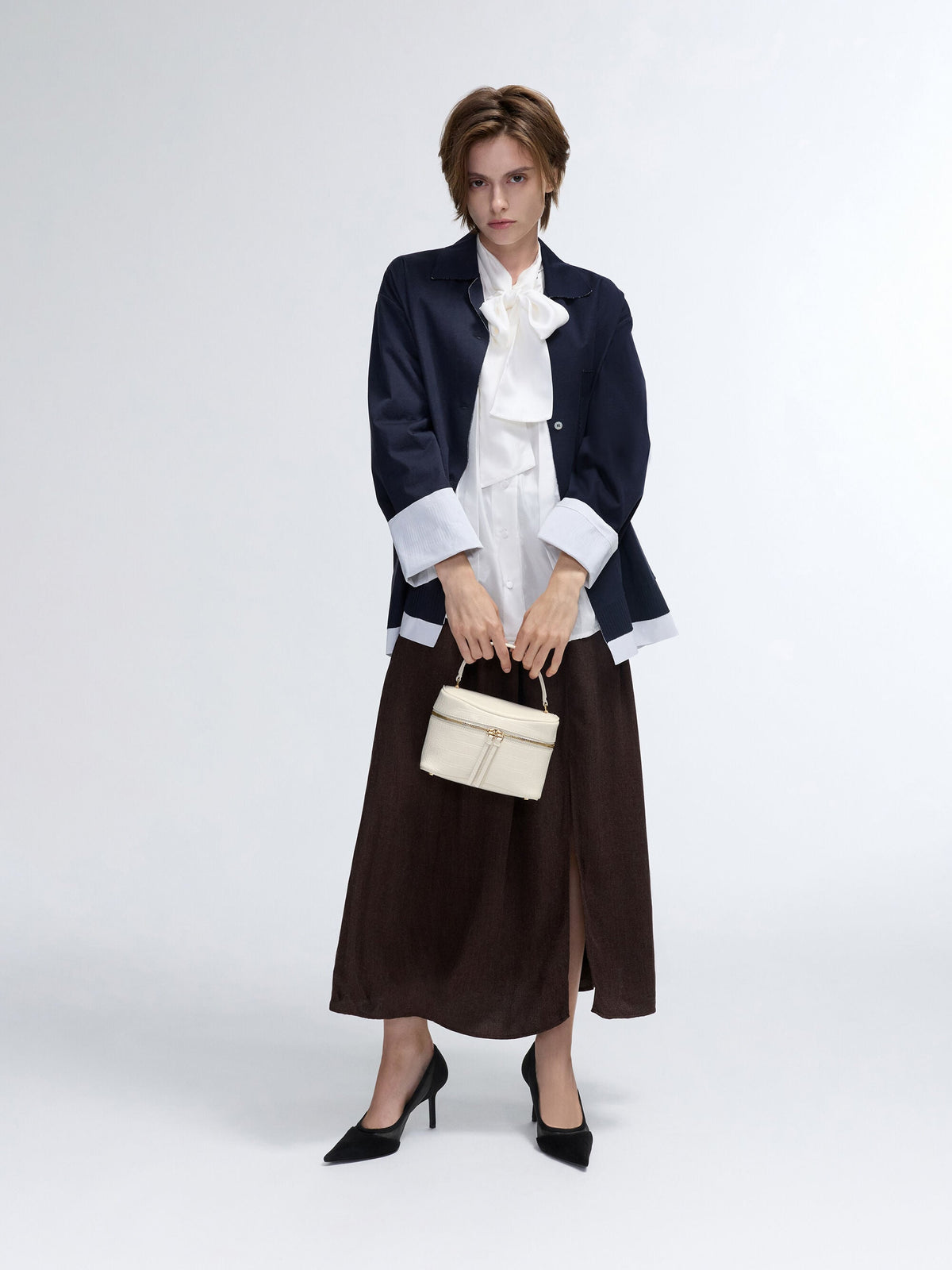 CHARLES & KEITH Deals / Pansy Croc-Effect Vanity Bag - Cream