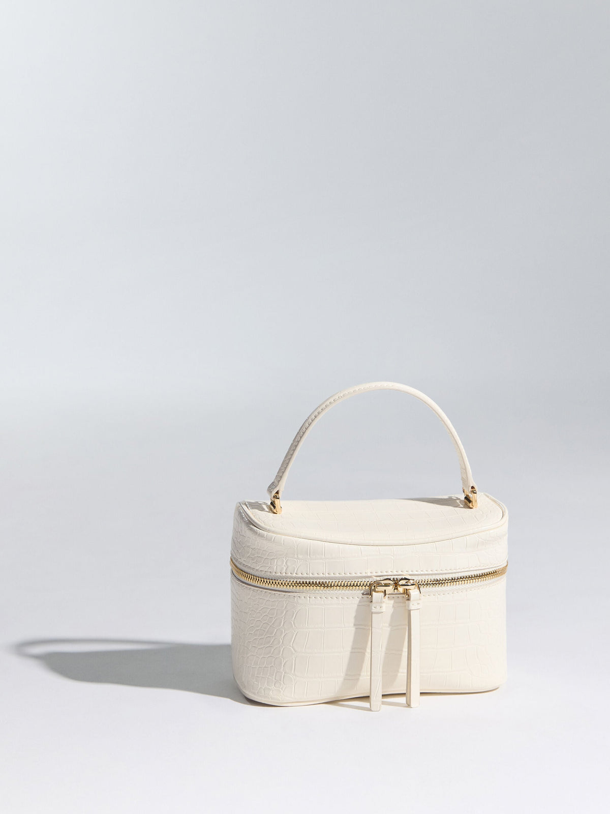 CHARLES & KEITH Deals / Pansy Croc-Effect Vanity Bag - Cream