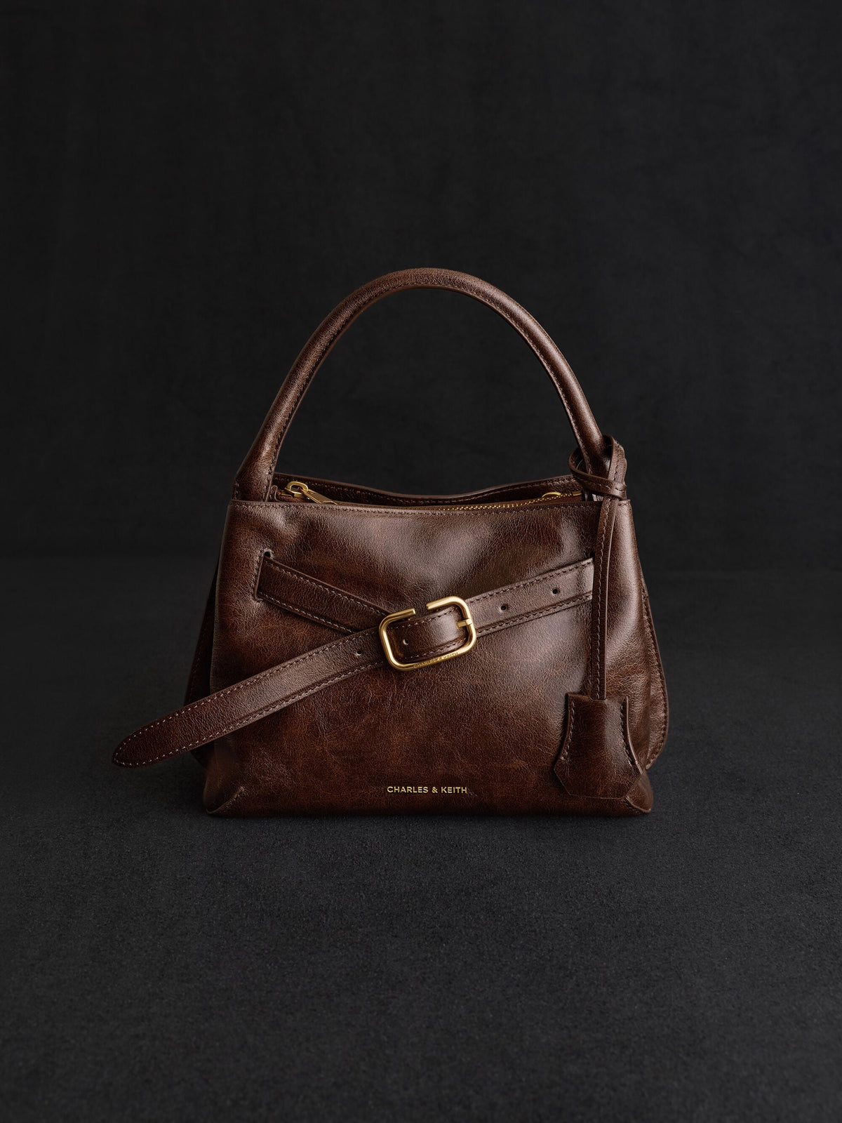 CHARLES & KEITH Latest / Victoria Belted Top Handle Bag - Distressed Coffee