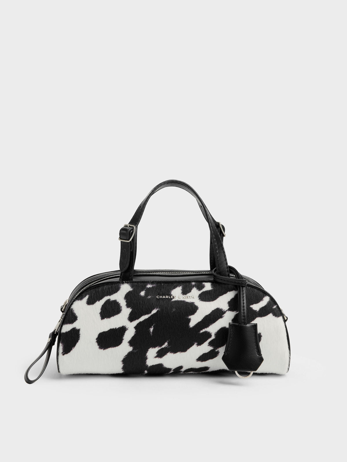 CHARLES & KEITH Smart Buy / Vega Furry Cow-Print Elongated Bowling Bag - Multi