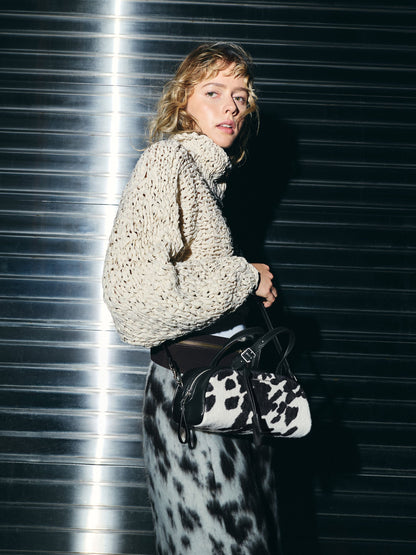 CHARLES & KEITH Smart Buy / Vega Furry Cow-Print Elongated Bowling Bag - Multi