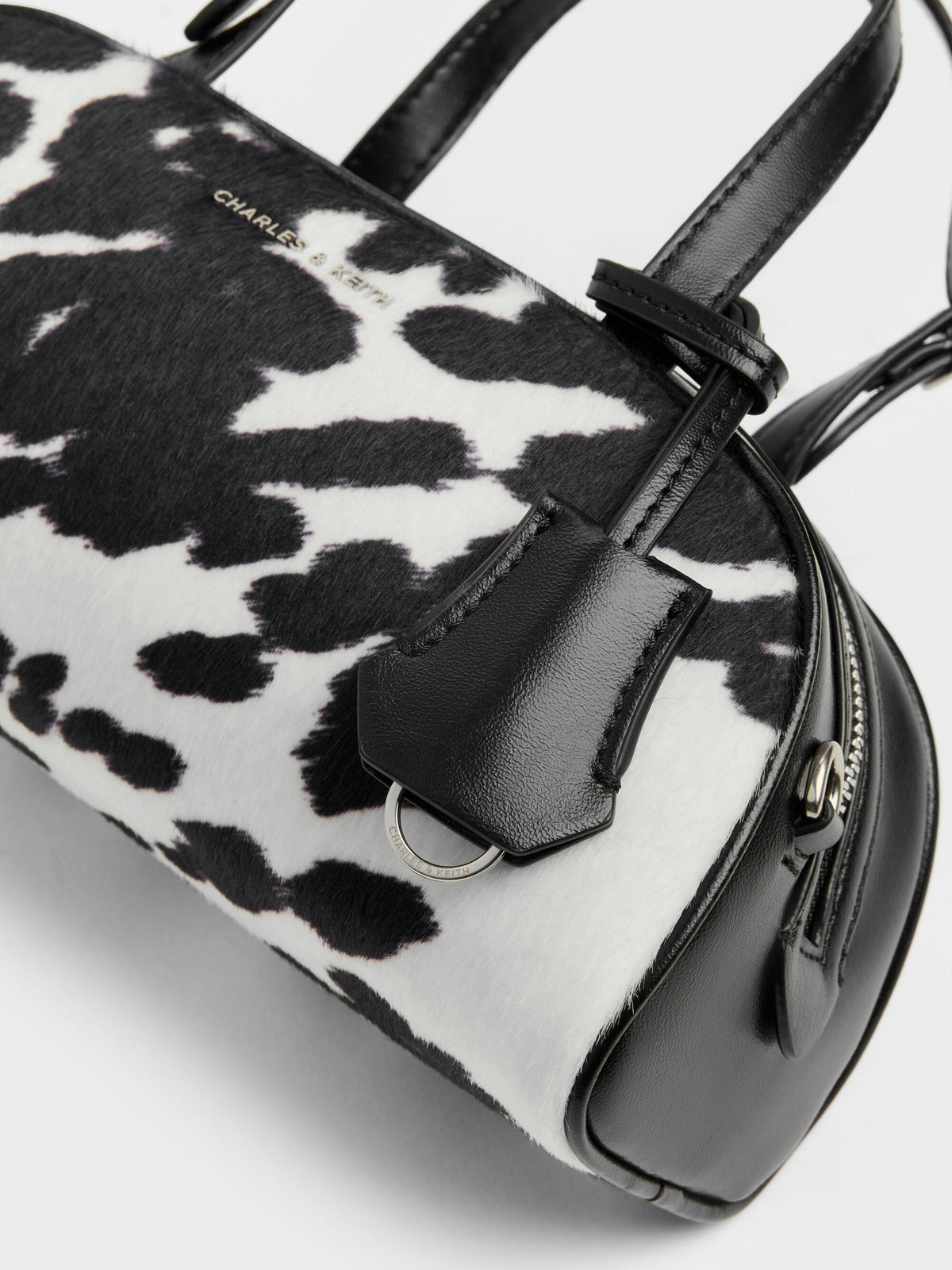 CHARLES & KEITH Smart Buy / Vega Furry Cow-Print Elongated Bowling Bag - Multi