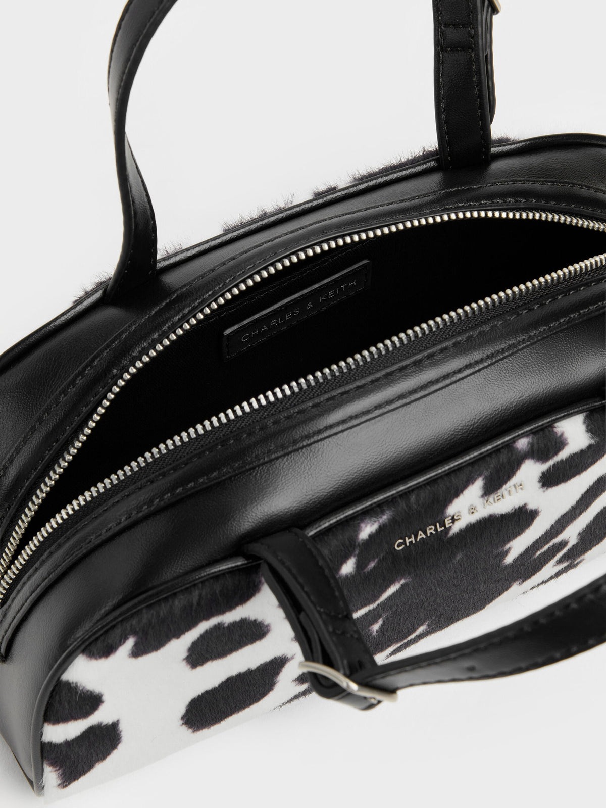 CHARLES & KEITH Smart Buy / Vega Furry Cow-Print Elongated Bowling Bag - Multi