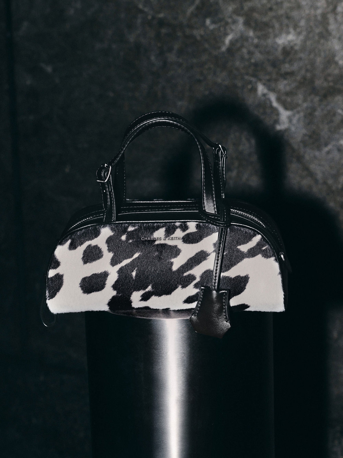 CHARLES & KEITH Smart Buy / Vega Furry Cow-Print Elongated Bowling Bag - Multi