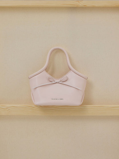 CHARLES & KEITH Hot Sale / Hazel Bow Tubular Top Handle Bag - Soft Pink