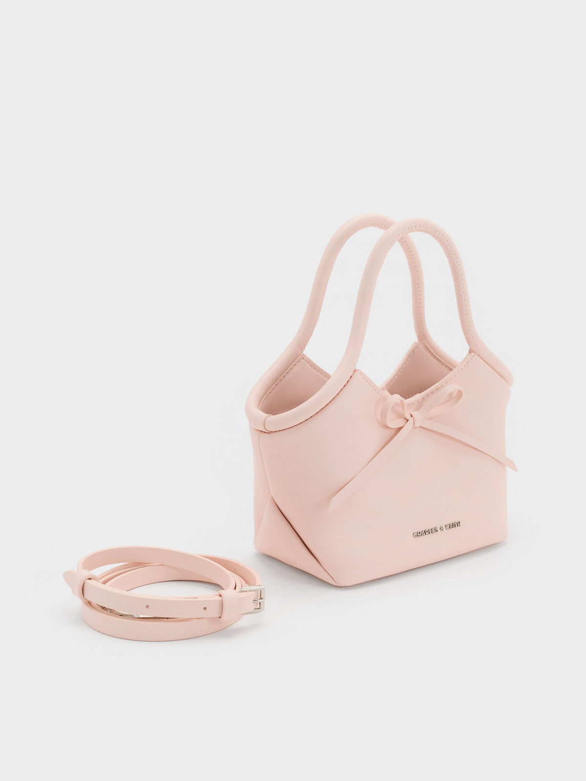 CHARLES & KEITH Hot Sale / Hazel Bow Tubular Top Handle Bag - Soft Pink