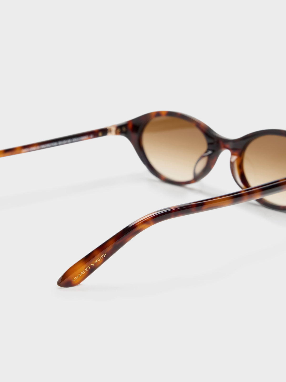 CHARLES & KEITH Deals / Pecola Oval Sunglasses - T. Shell