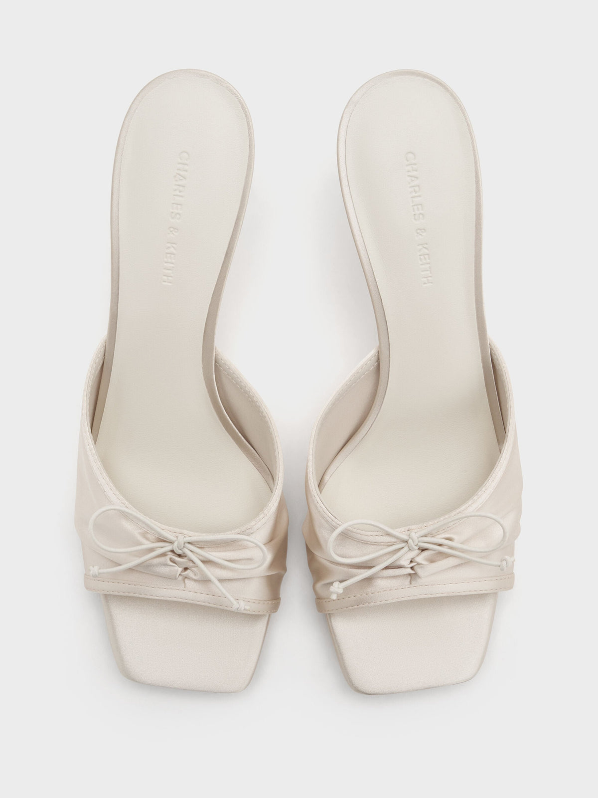 CHARLES & KEITH Trending / Sadira Satin Ruched Bow Heeled Mules - Chalk