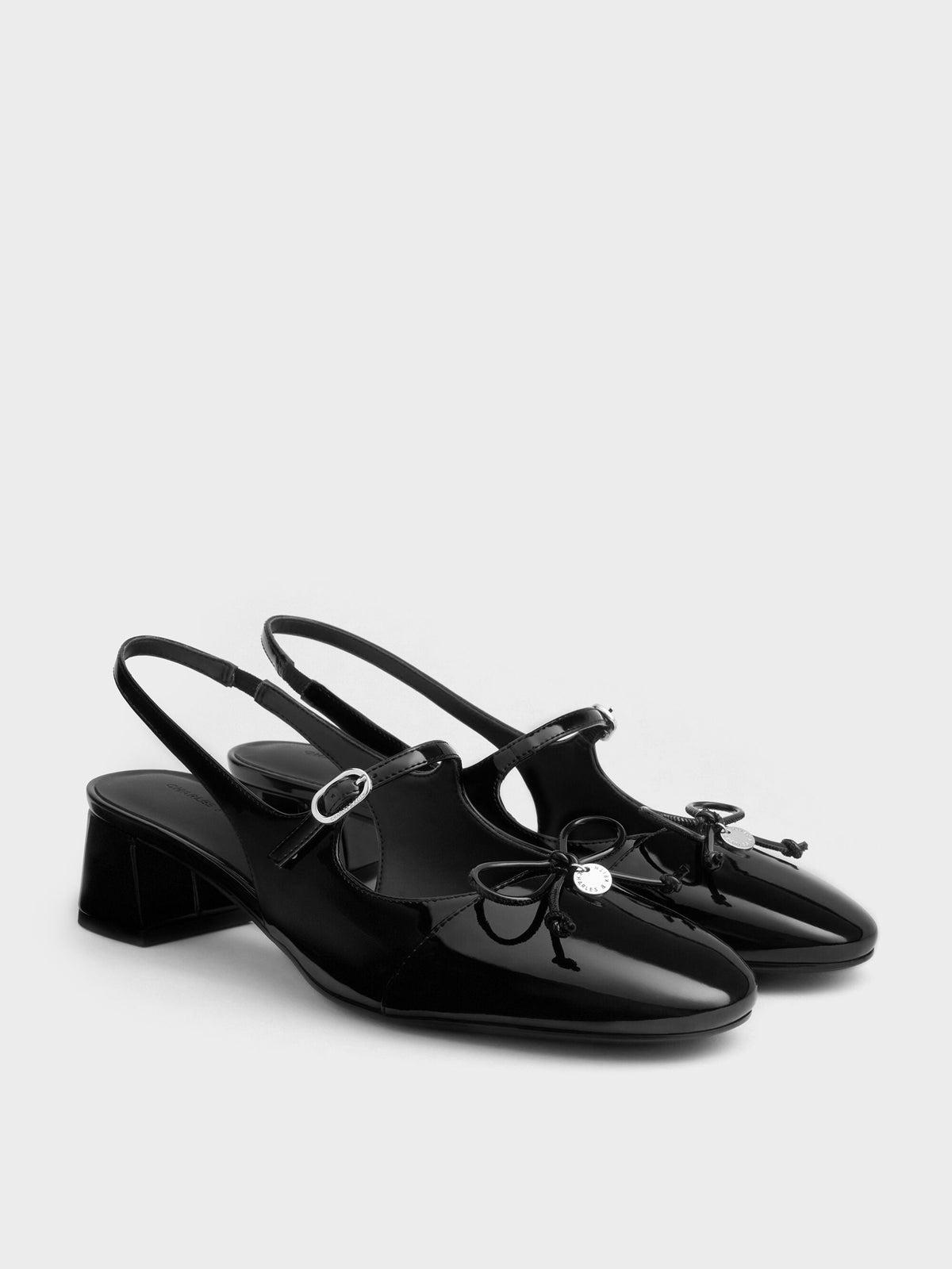 CHARLES & KEITH Essential / Patent Bow Slingback Pumps - Black Patent