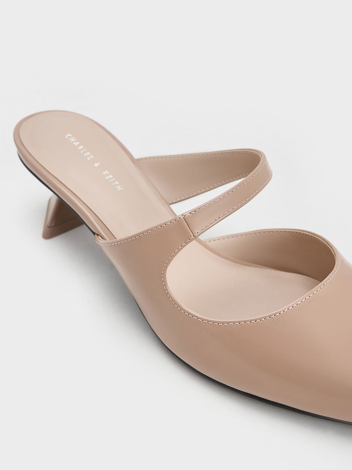 CHARLES & KEITH Popular / Vada Patent Asymmetric Sculptural Heel Pumps - Nude
