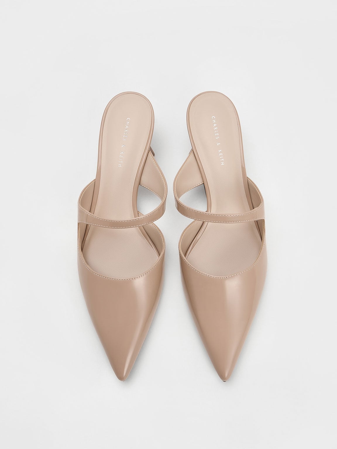 CHARLES & KEITH Popular / Vada Patent Asymmetric Sculptural Heel Pumps - Nude