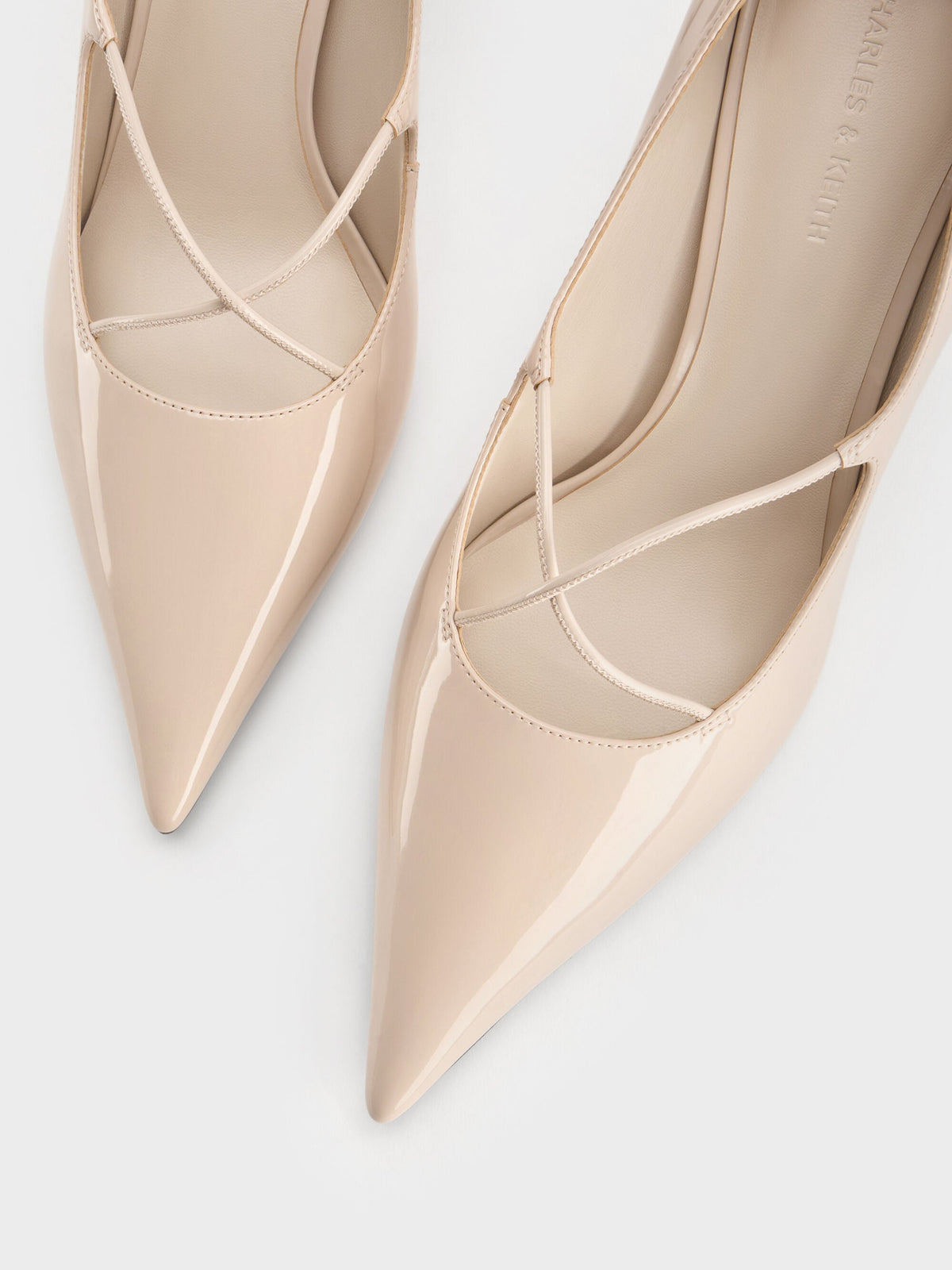 CHARLES & KEITH Hot Sale / Patent Crossover Pointed Pumps - Nude