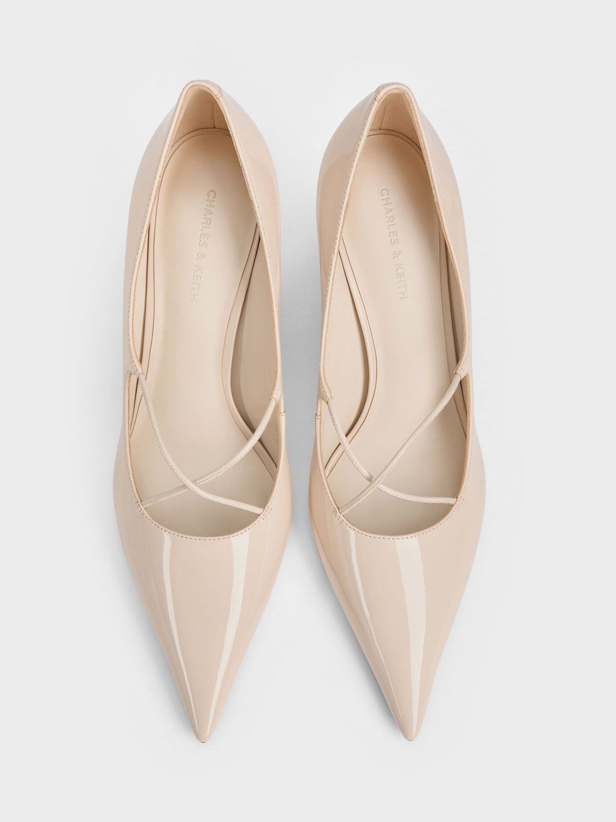 CHARLES & KEITH Hot Sale / Patent Crossover Pointed Pumps - Nude