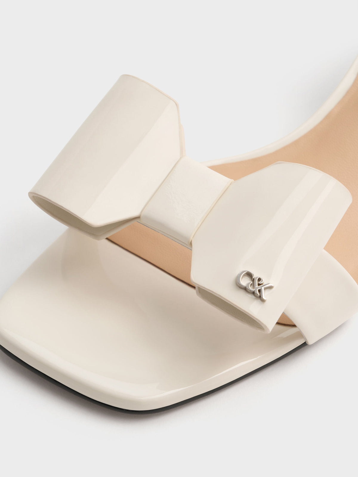 CHARLES & KEITH Hot Sale / Lu Patent Leather Bow Heeled Sandals - Chalk