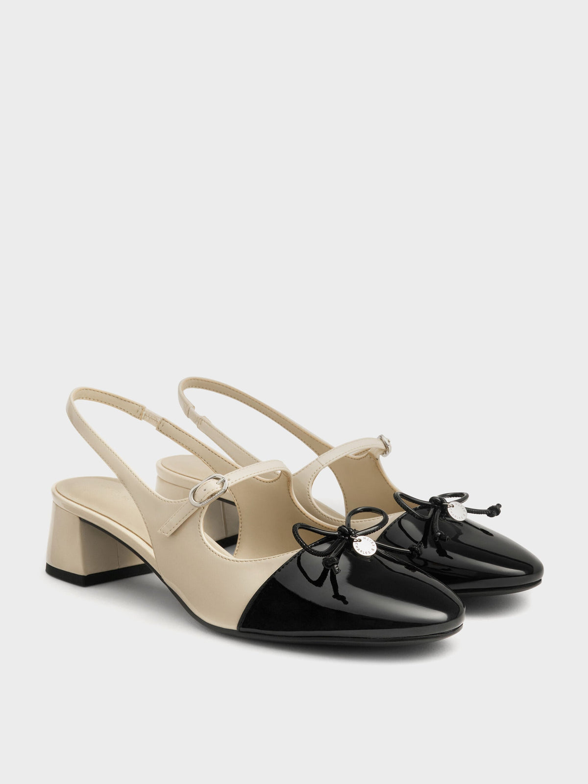 CHARLES & KEITH Trusted / Two-Tone Patent Bow Slingback Pumps - Chalk