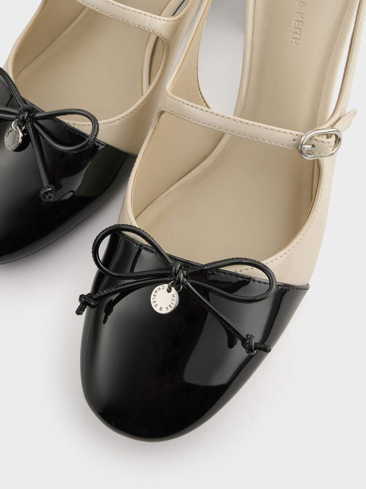 CHARLES & KEITH Trusted / Two-Tone Patent Bow Slingback Pumps - Chalk