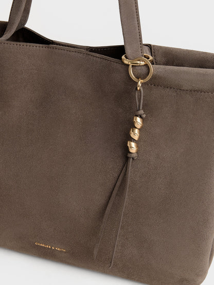 CHARLES & KEITH Deals / XL Zephyr Tassel Tote Bag - Stone Grey