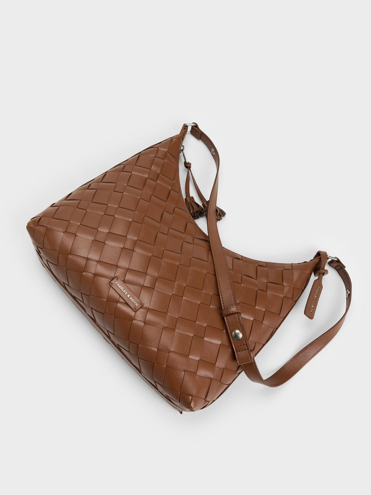 CHARLES & KEITH Hot Sale / Ivette Woven Tassel Hobo Bag - Chocolate