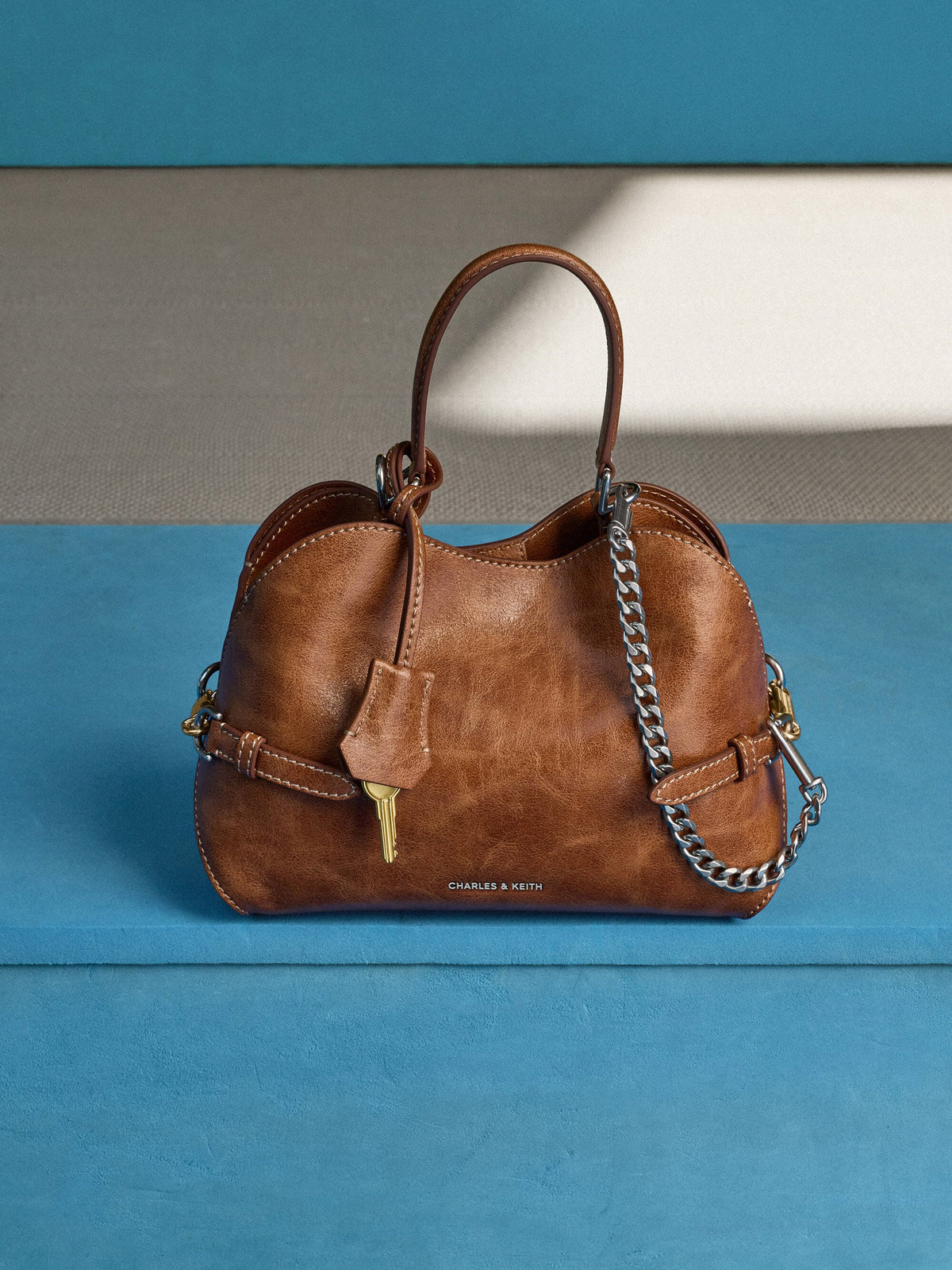 CHARLES & KEITH Quality / Delfina Chain Side-Belt Tote Bag - Distressed Tan