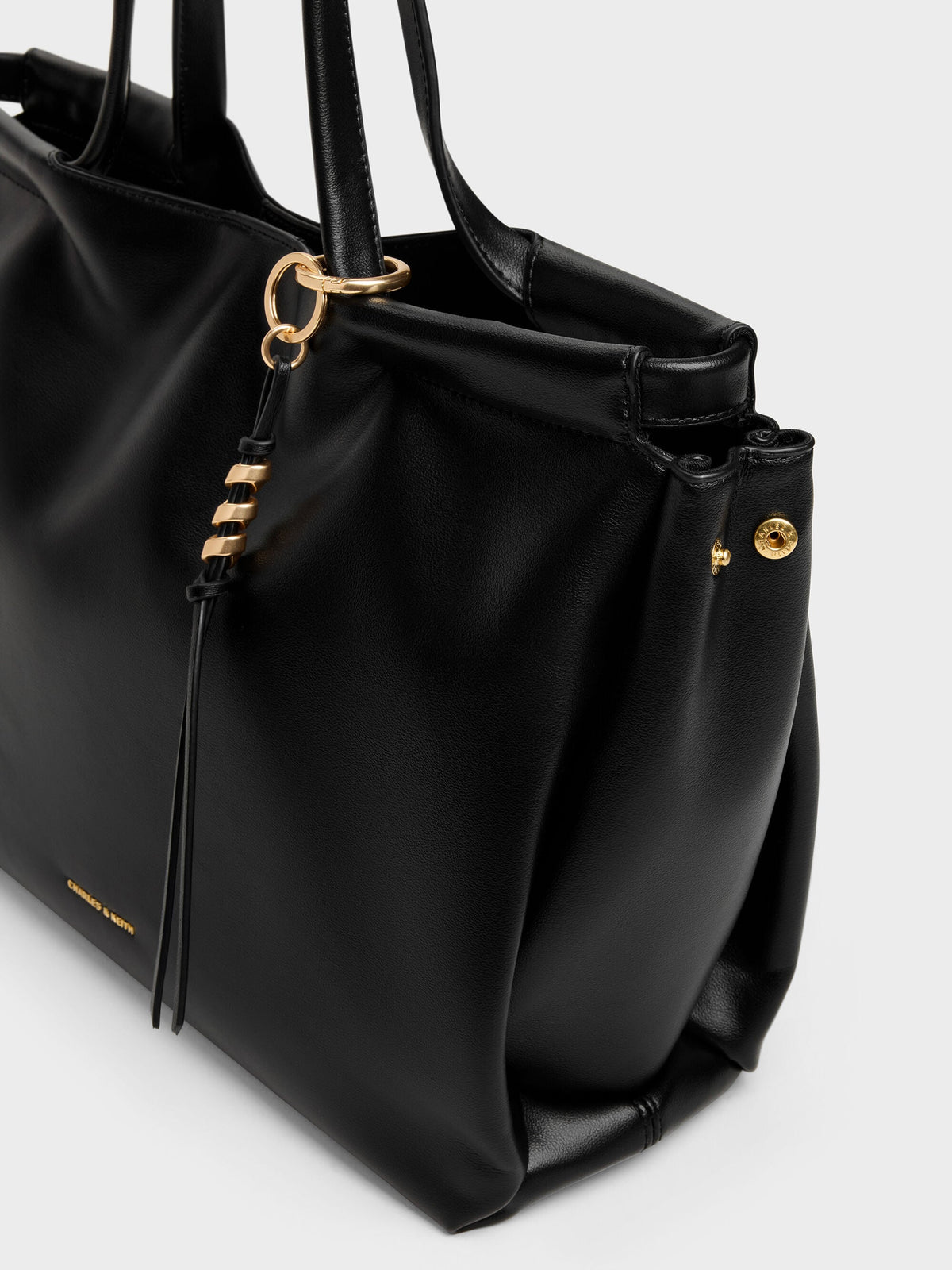 CHARLES & KEITH Trending / XL Zephyr Tassel Tote Bag - Black