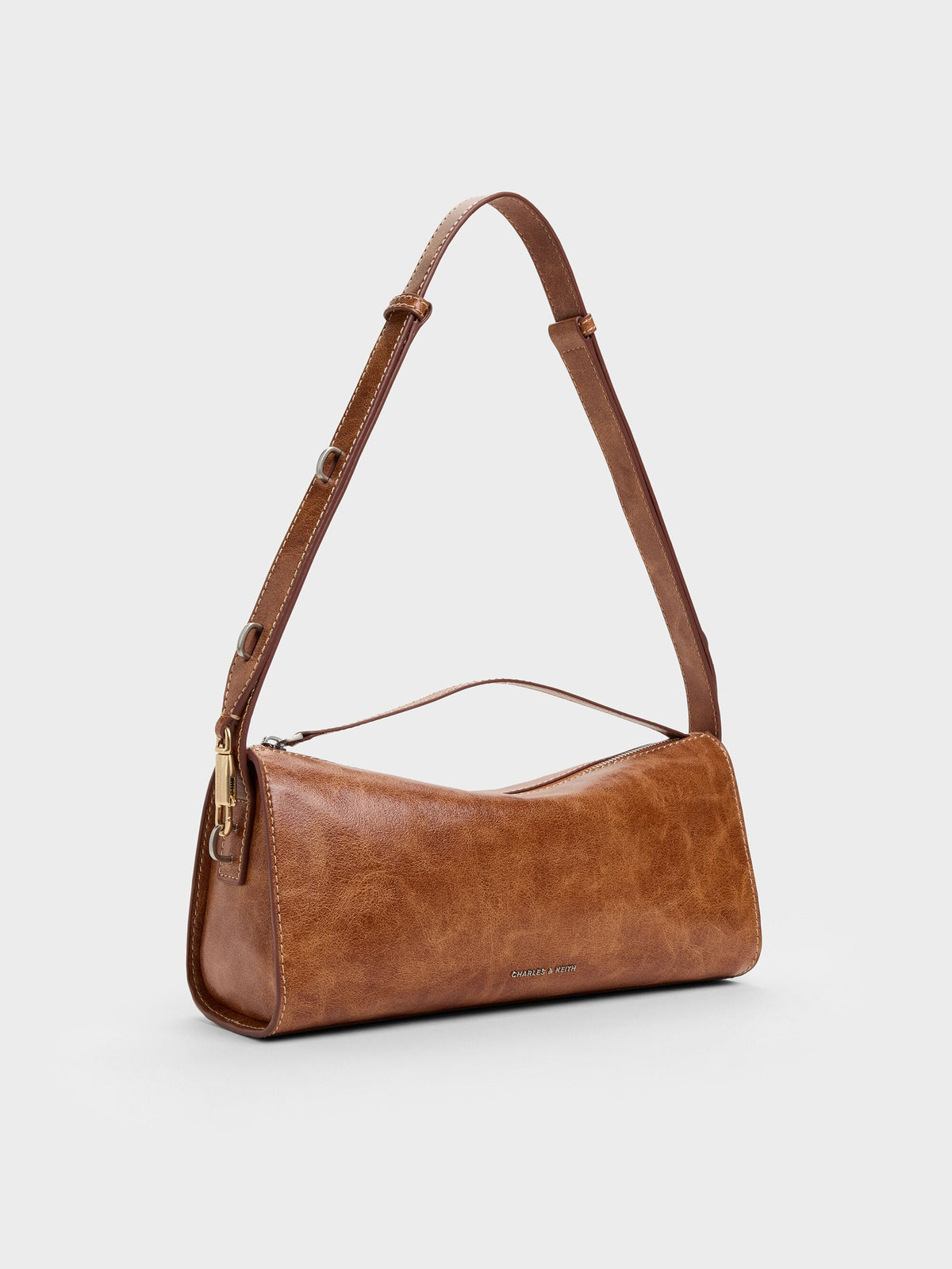 CHARLES & KEITH Customer Favorite / Delfina Elongated Shoulder Bag - Distressed Tan