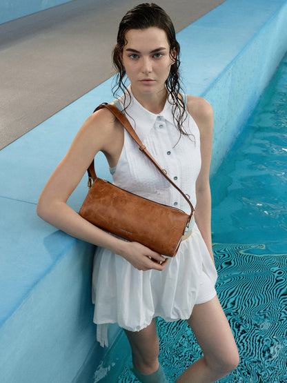 CHARLES & KEITH Customer Favorite / Delfina Elongated Shoulder Bag - Distressed Tan