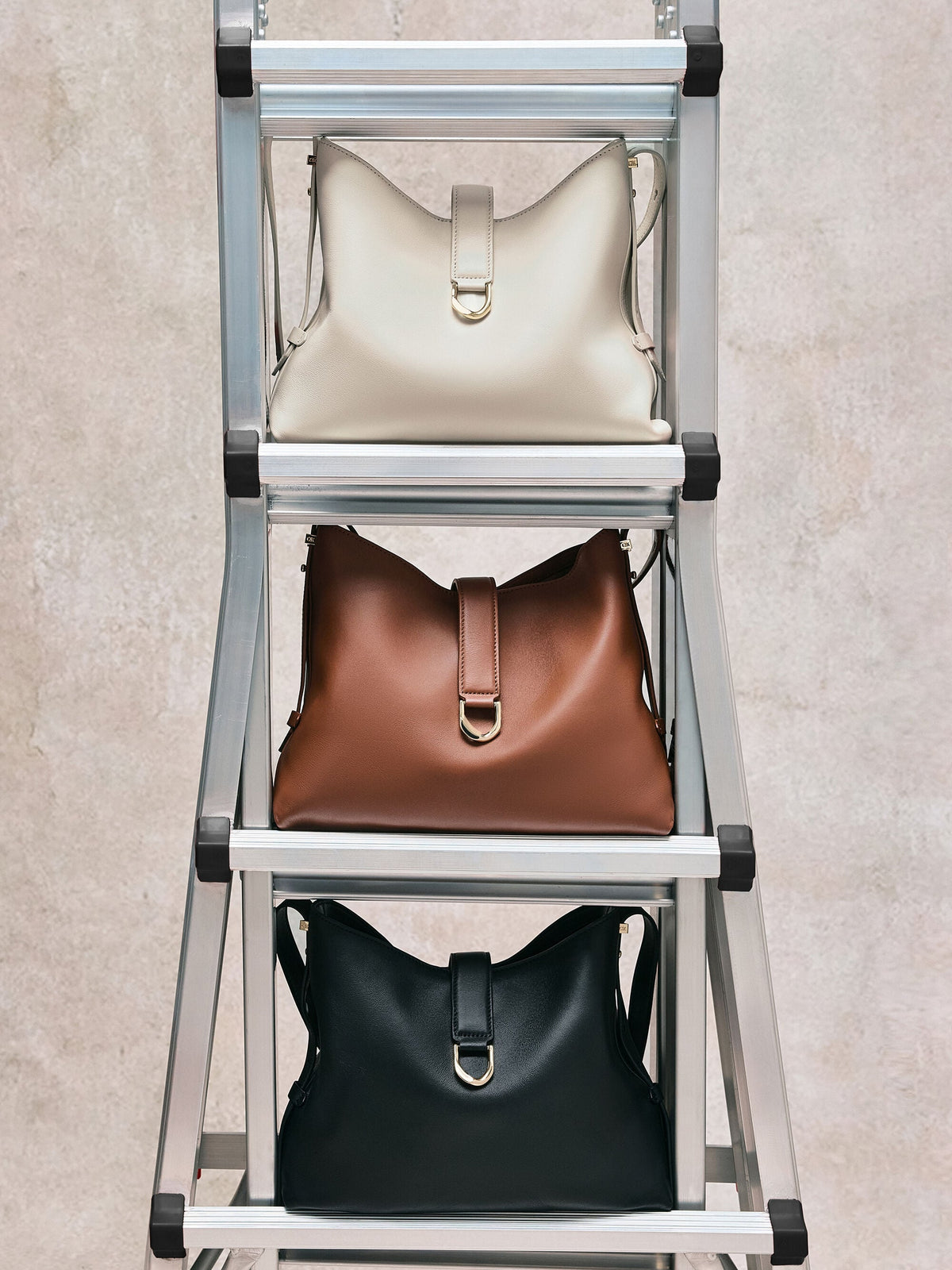CHARLES & KEITH Customer Favorite / Gabine Leather Belted Hobo Bag - Chocolate