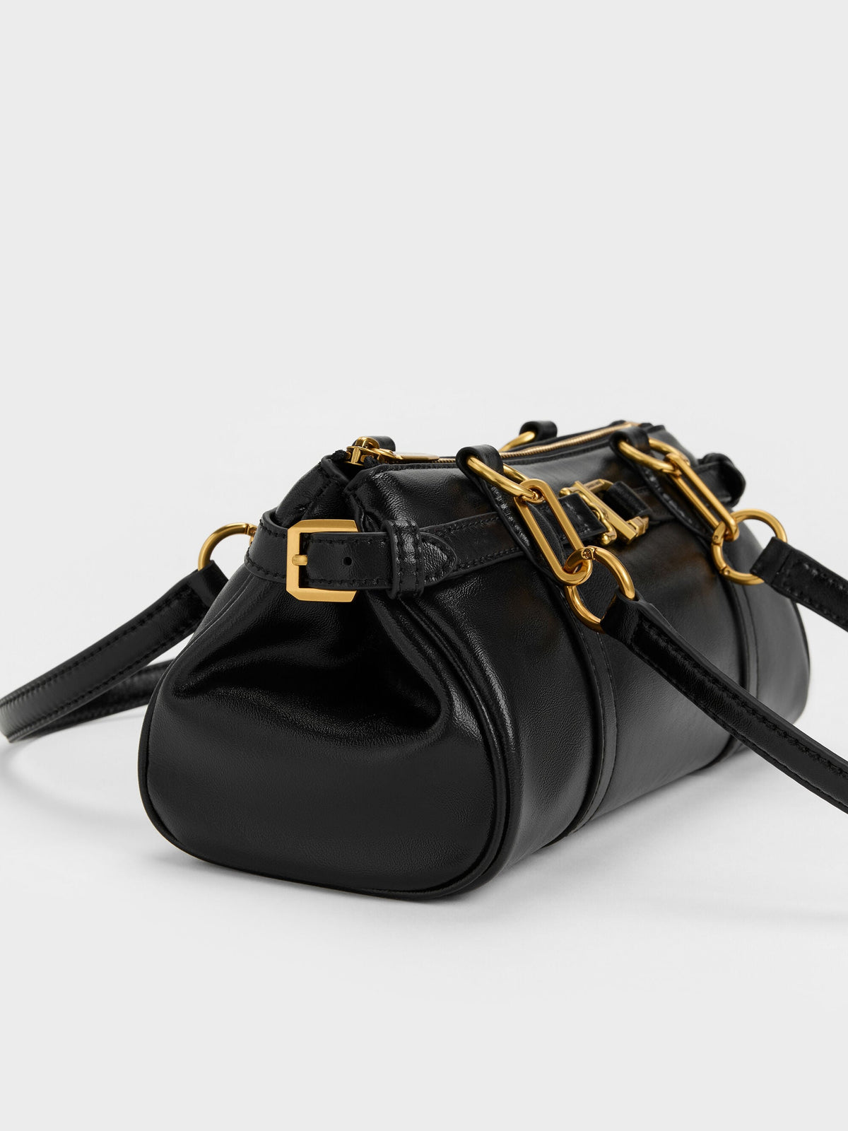 CHARLES & KEITH Deals / Gwynne Metallic-Accent Elongated Shoulder Bag - Black