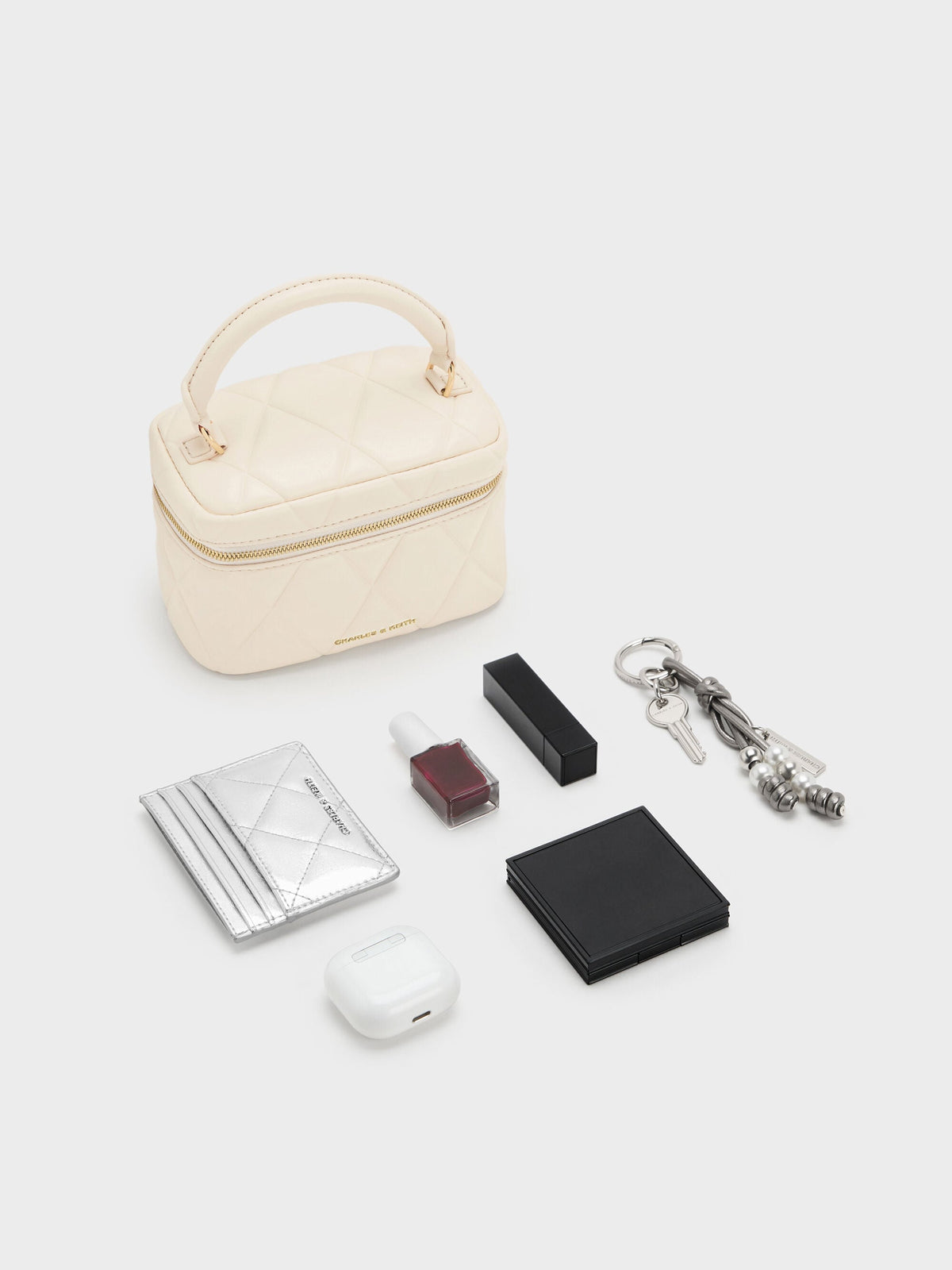 CHARLES & KEITH Recommended / Arwen Quilted Top Handle Vanity Bag - Cream