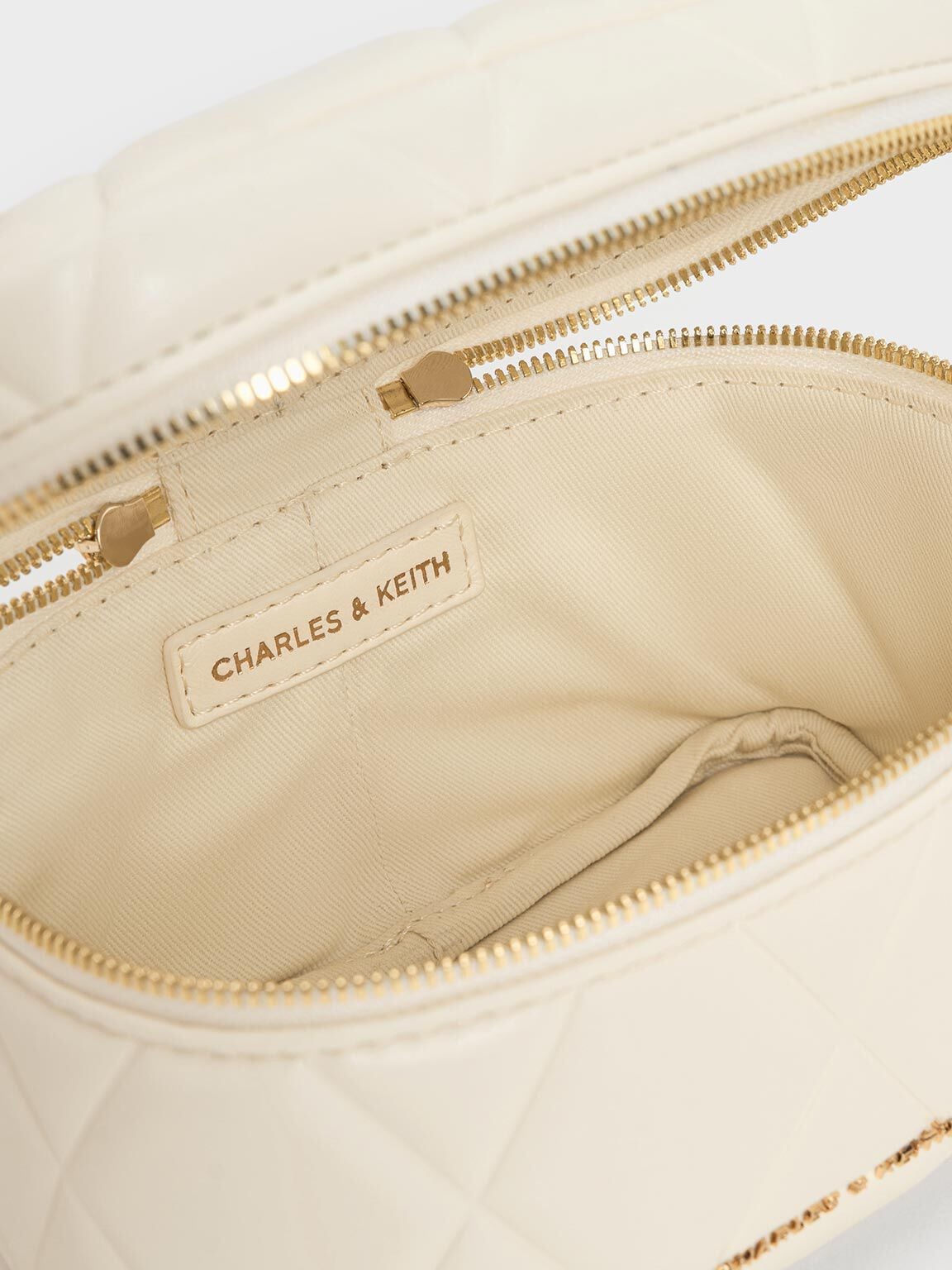 CHARLES & KEITH Recommended / Arwen Quilted Top Handle Vanity Bag - Cream