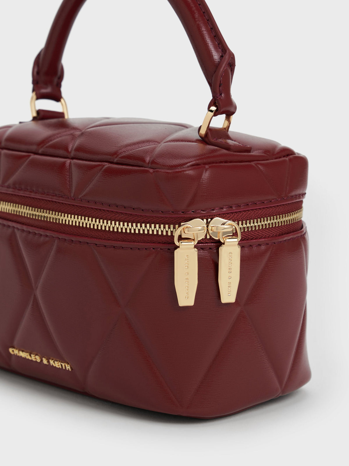 CHARLES & KEITH Smart Buy / Arwen Quilted Vanity Bag - Burgundy