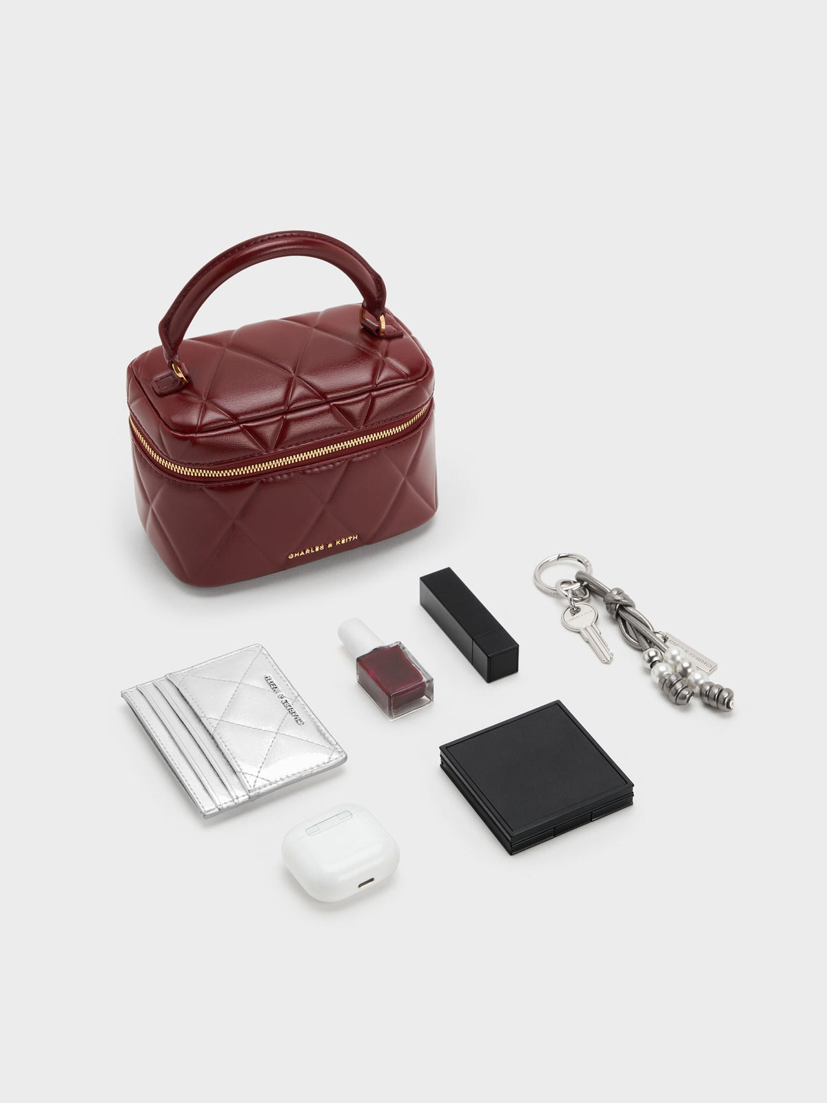 CHARLES & KEITH Smart Buy / Arwen Quilted Vanity Bag - Burgundy