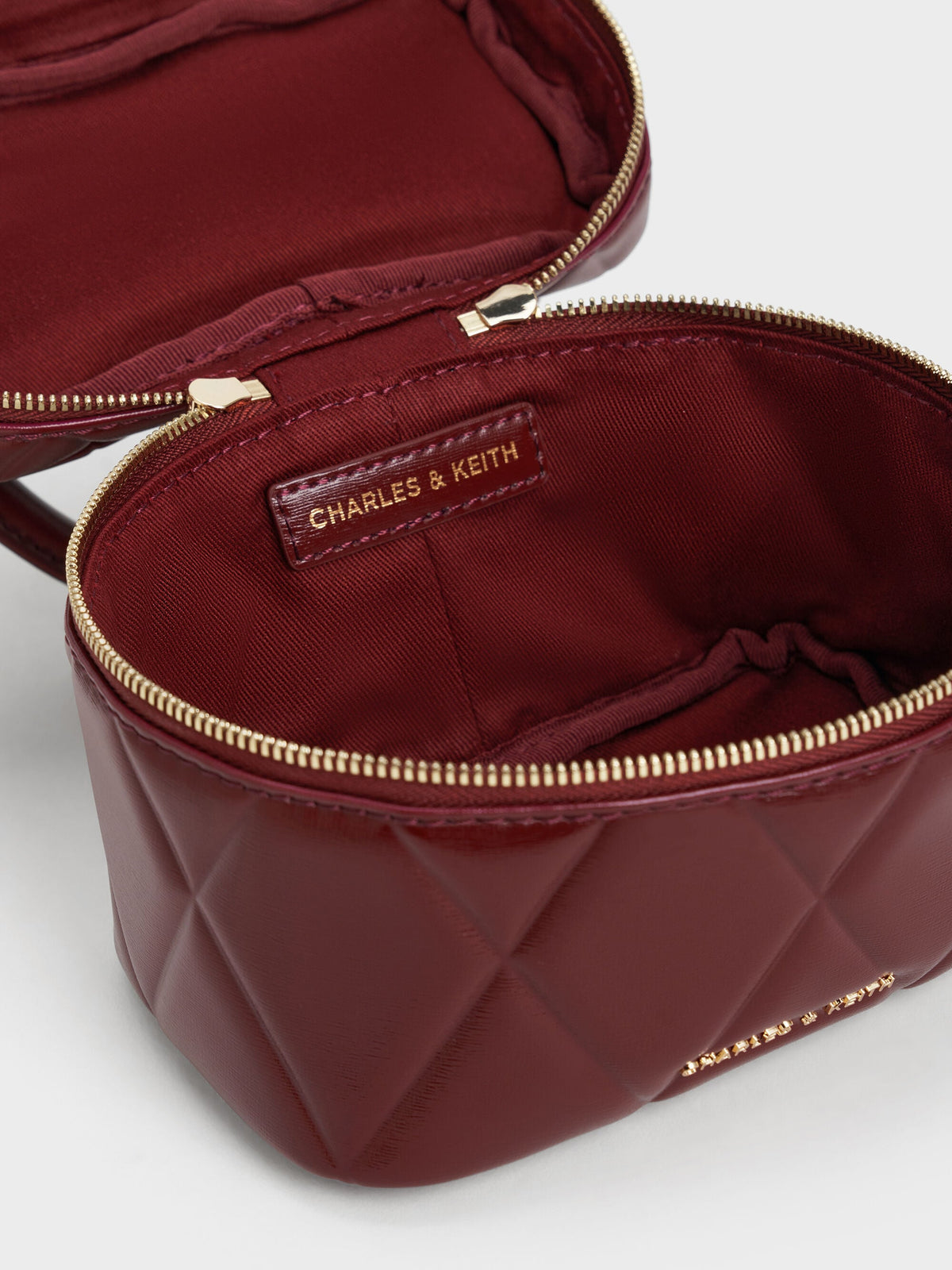 CHARLES & KEITH Smart Buy / Arwen Quilted Vanity Bag - Burgundy