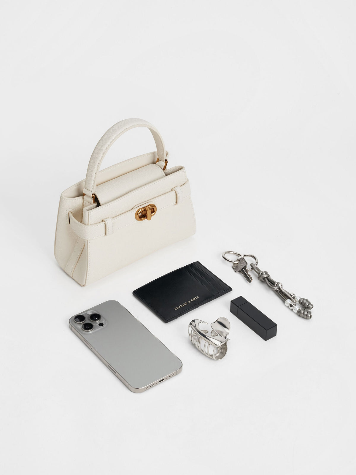 CHARLES & KEITH Best Seller / Aubrielle Belted Top Handle Bag - Cream