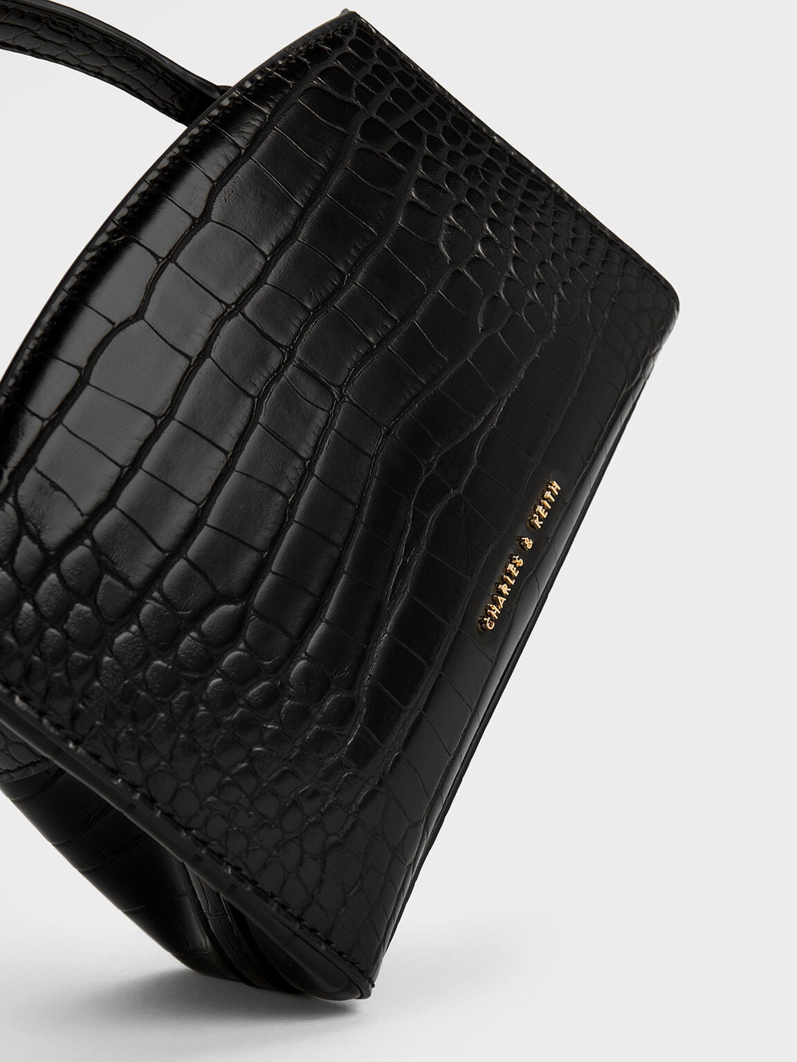 CHARLES & KEITH Recommended / Aubrielle Croc-Effect Belted Top Handle Bag - Black