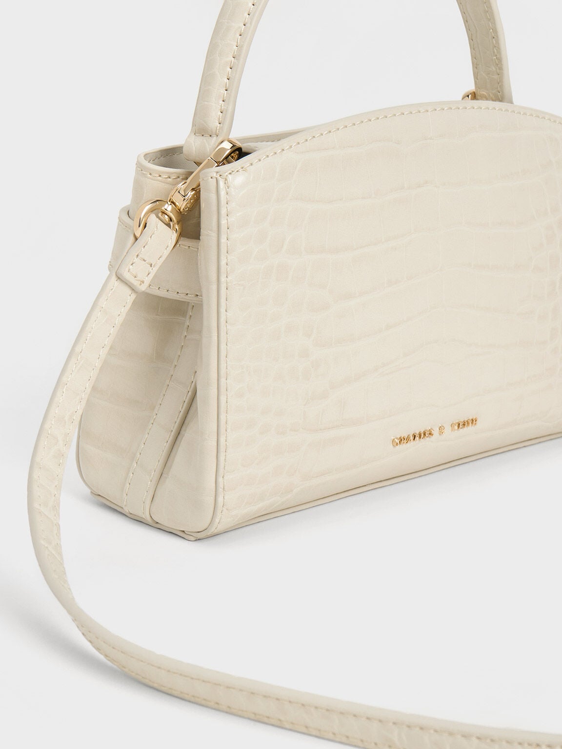 CHARLES & KEITH Trusted / Aubrielle Croc-Effect Belted Top Handle Bag - Ivory