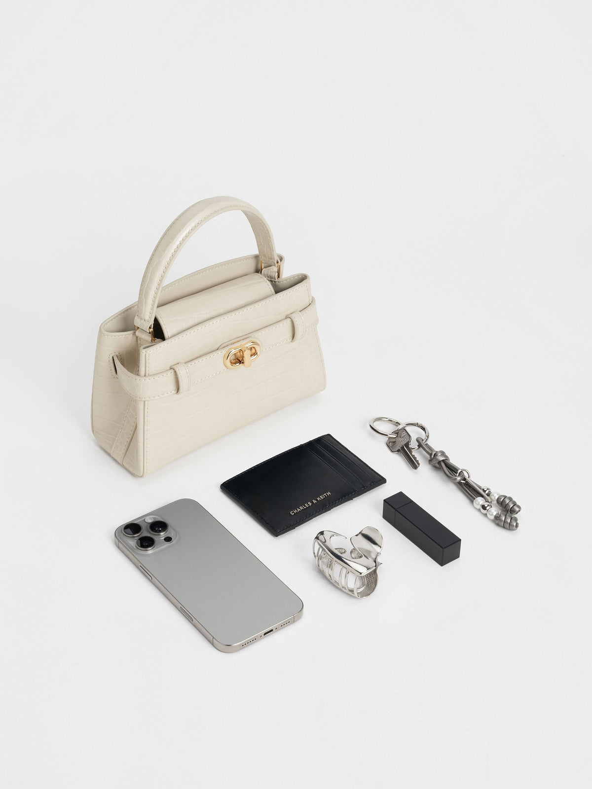 CHARLES & KEITH Trusted / Aubrielle Croc-Effect Belted Top Handle Bag - Ivory