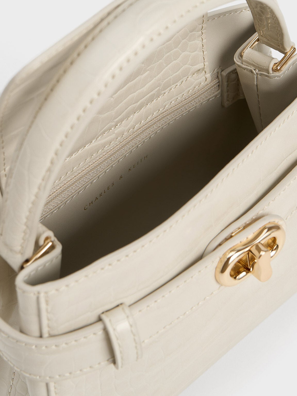 CHARLES & KEITH Trusted / Aubrielle Croc-Effect Belted Top Handle Bag - Ivory