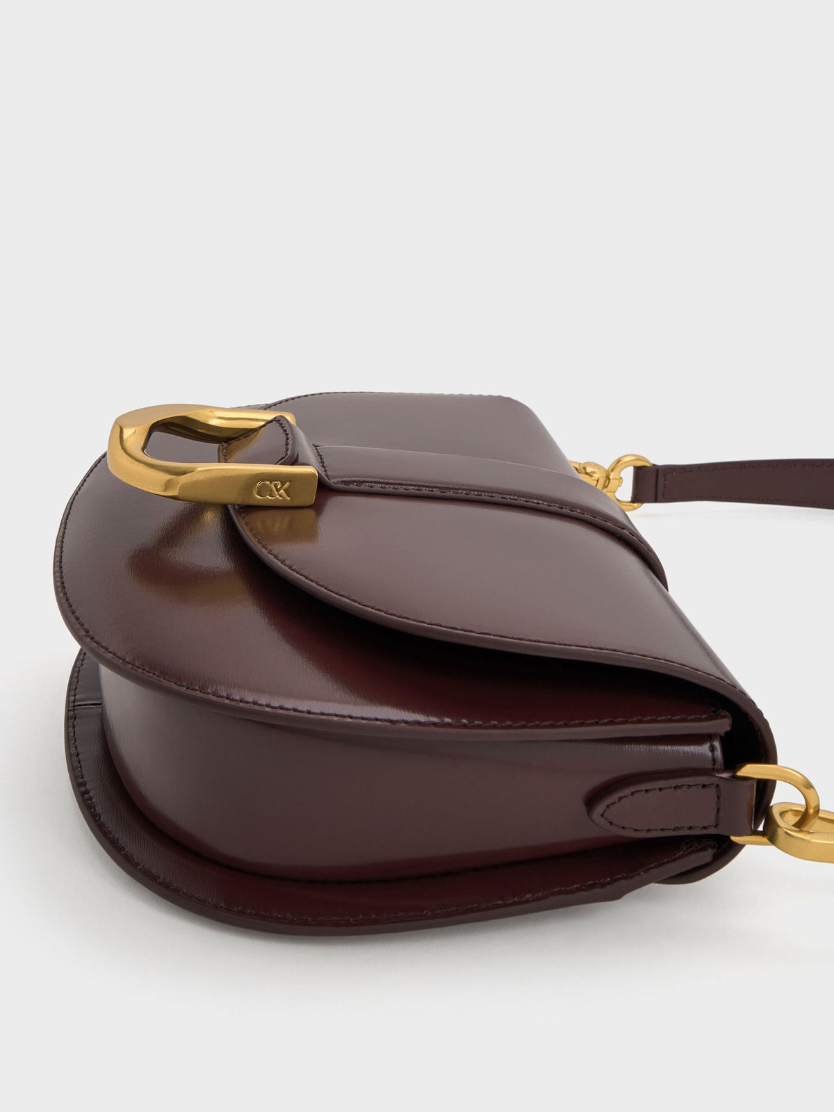 CHARLES & KEITH Signature / Gabine Leather Saddle Bag - Plum