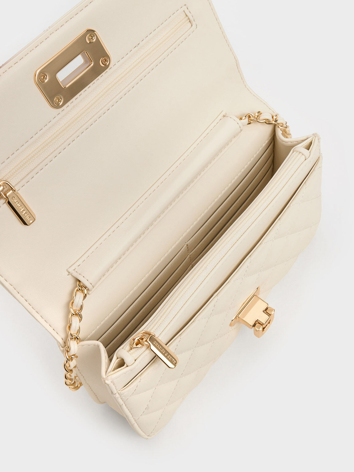 CHARLES & KEITH Customer Favorite / Cressida Quilted Push-Lock Clutch - Cream