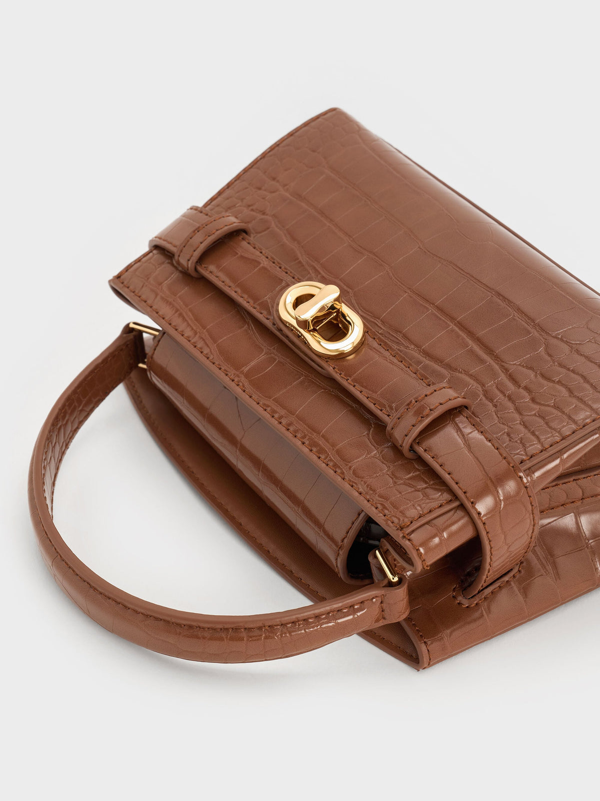 CHARLES & KEITH Signature / Aubrielle Croc-Effect Belted Top Handle Bag - Chocolate Croco