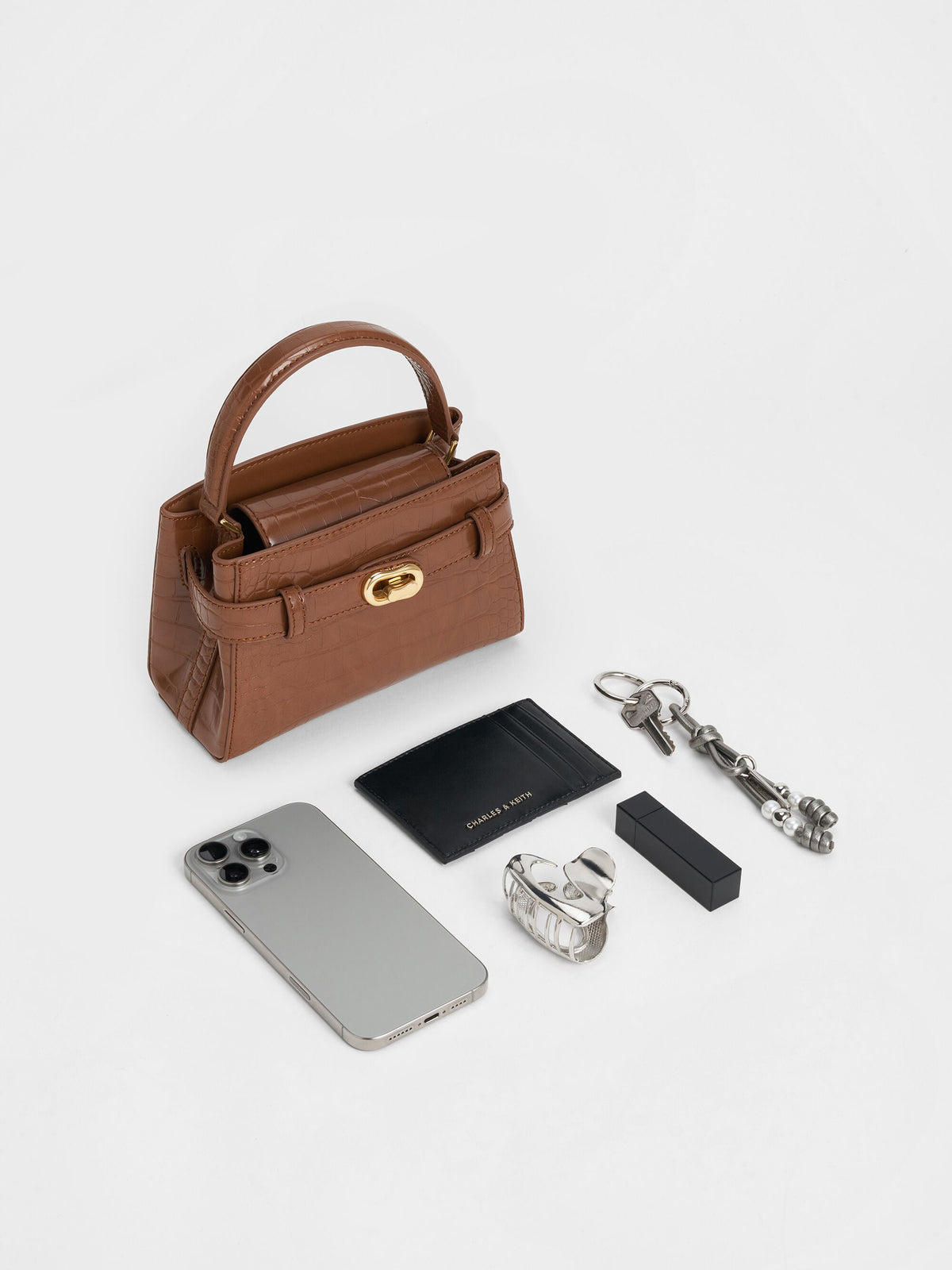CHARLES & KEITH Signature / Aubrielle Croc-Effect Belted Top Handle Bag - Chocolate Croco