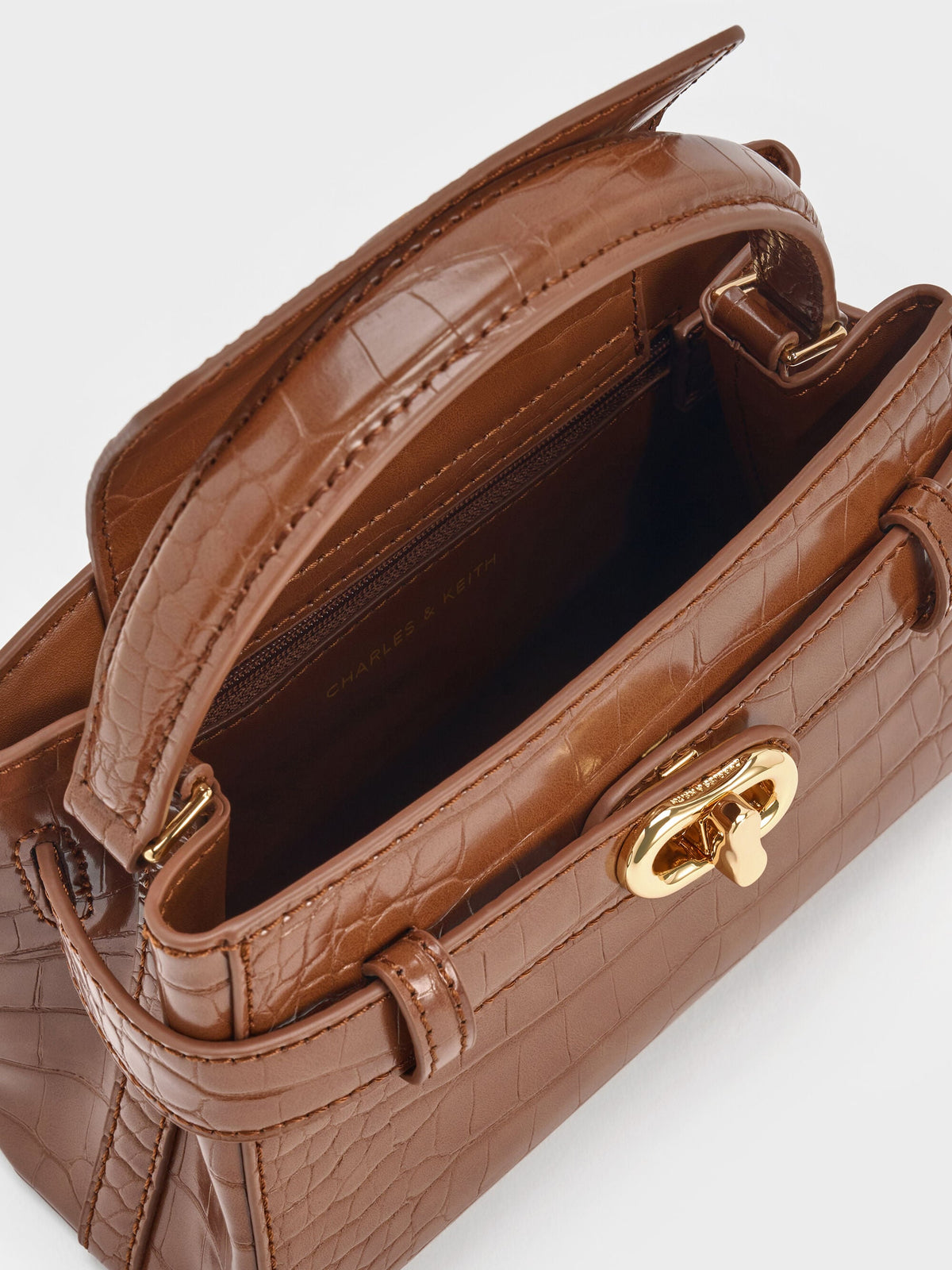 CHARLES & KEITH Signature / Aubrielle Croc-Effect Belted Top Handle Bag - Chocolate Croco