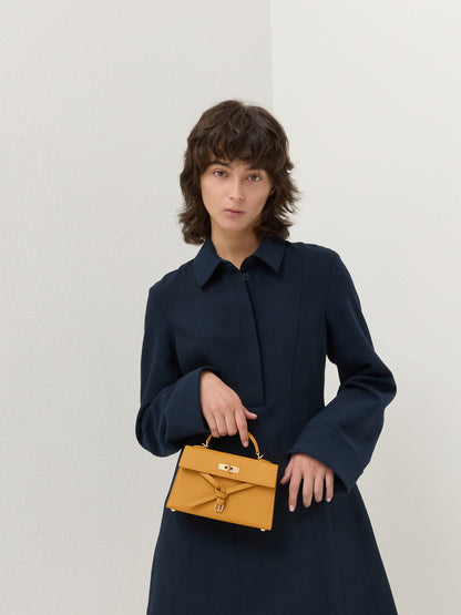 CHARLES & KEITH Recommended / Tricha Knotted-Belt Top Handle Bag - Saffron Yellow