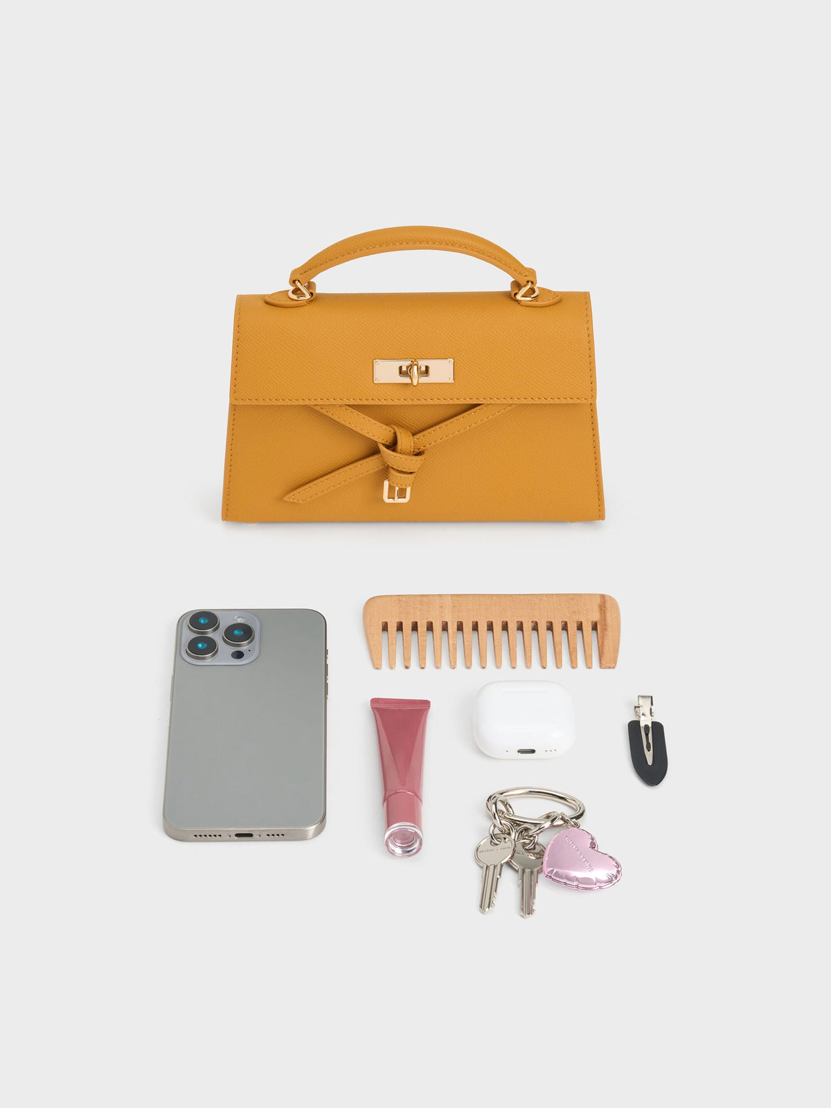 CHARLES & KEITH Recommended / Tricha Knotted-Belt Top Handle Bag - Saffron Yellow