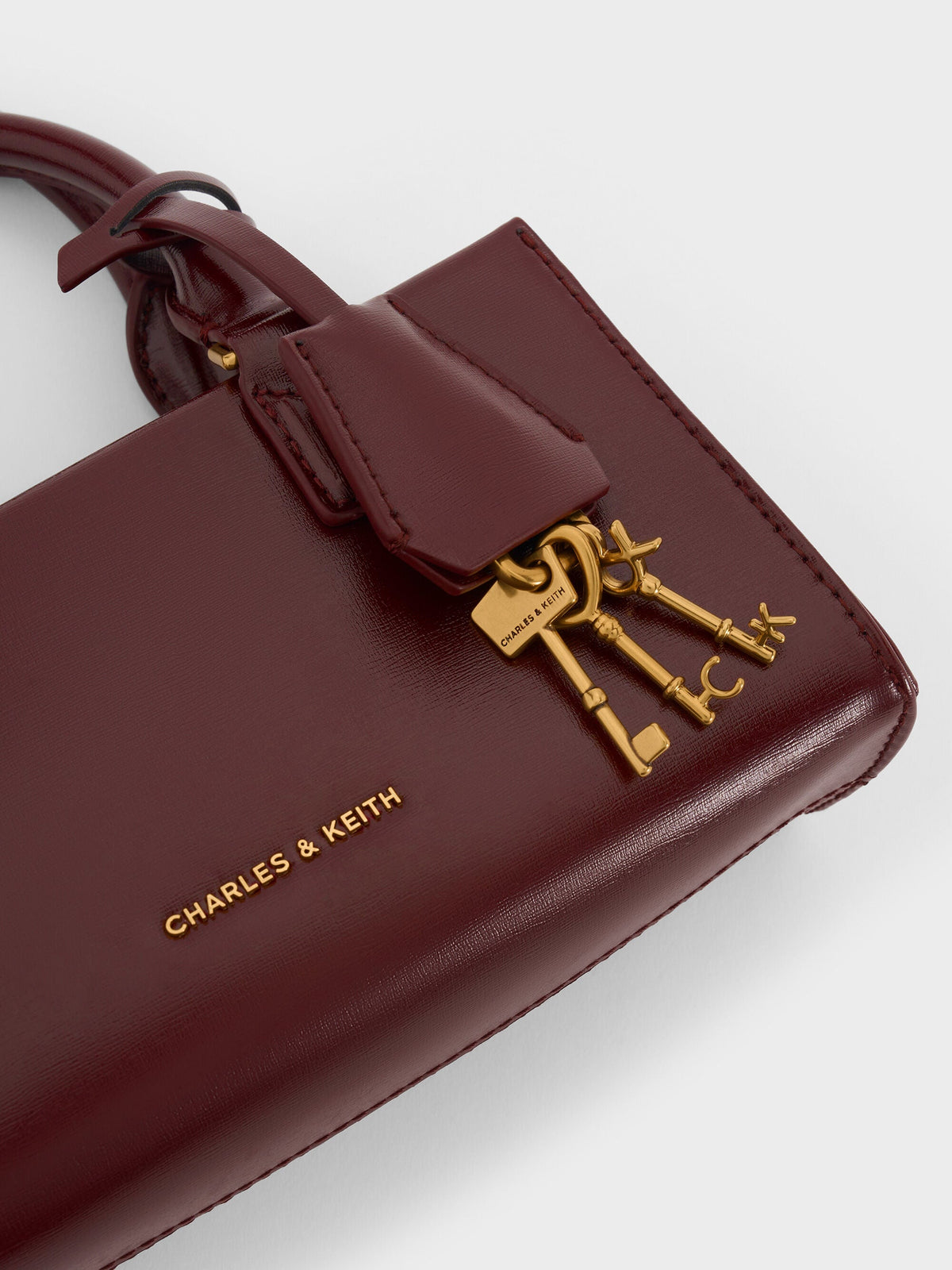 CHARLES & KEITH Recommended / Mini Kerry Top Handle Bag - Wineberry Red