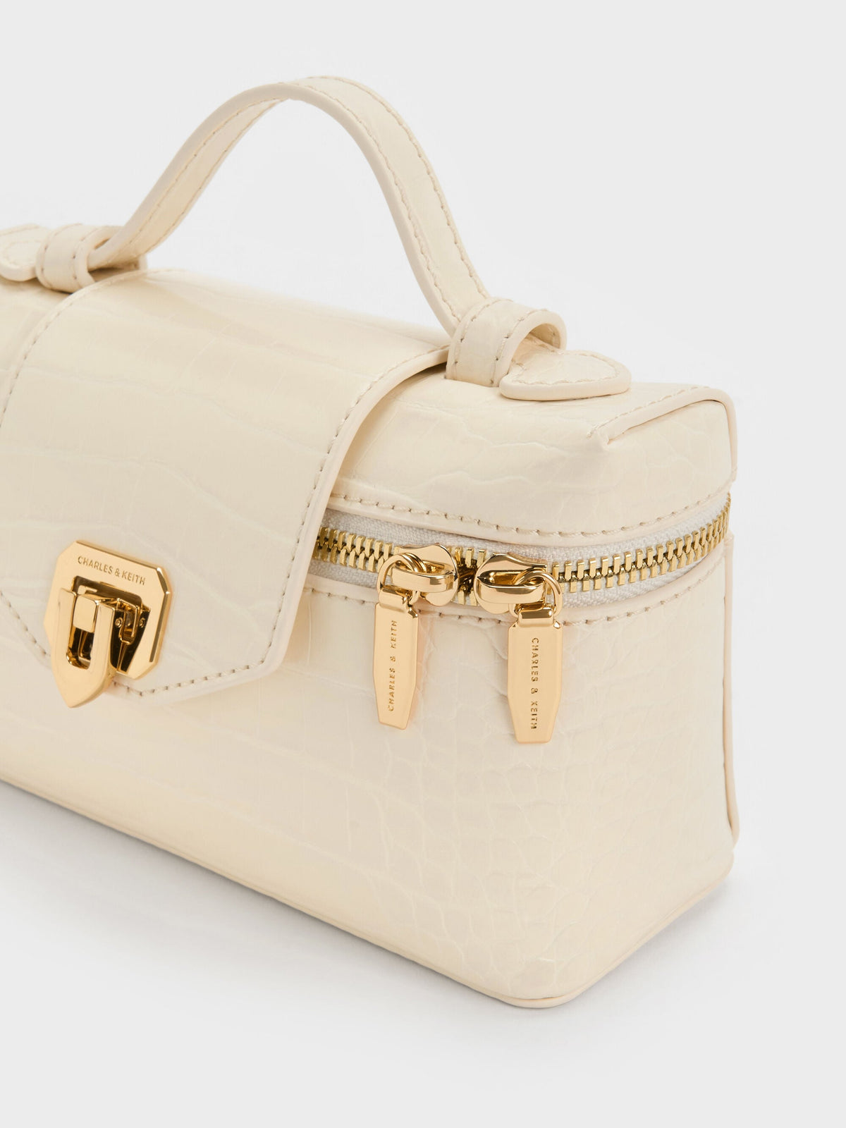 CHARLES & KEITH Everyday / Arwen Croc-Effect Top Handle Vanity Bag - Cream