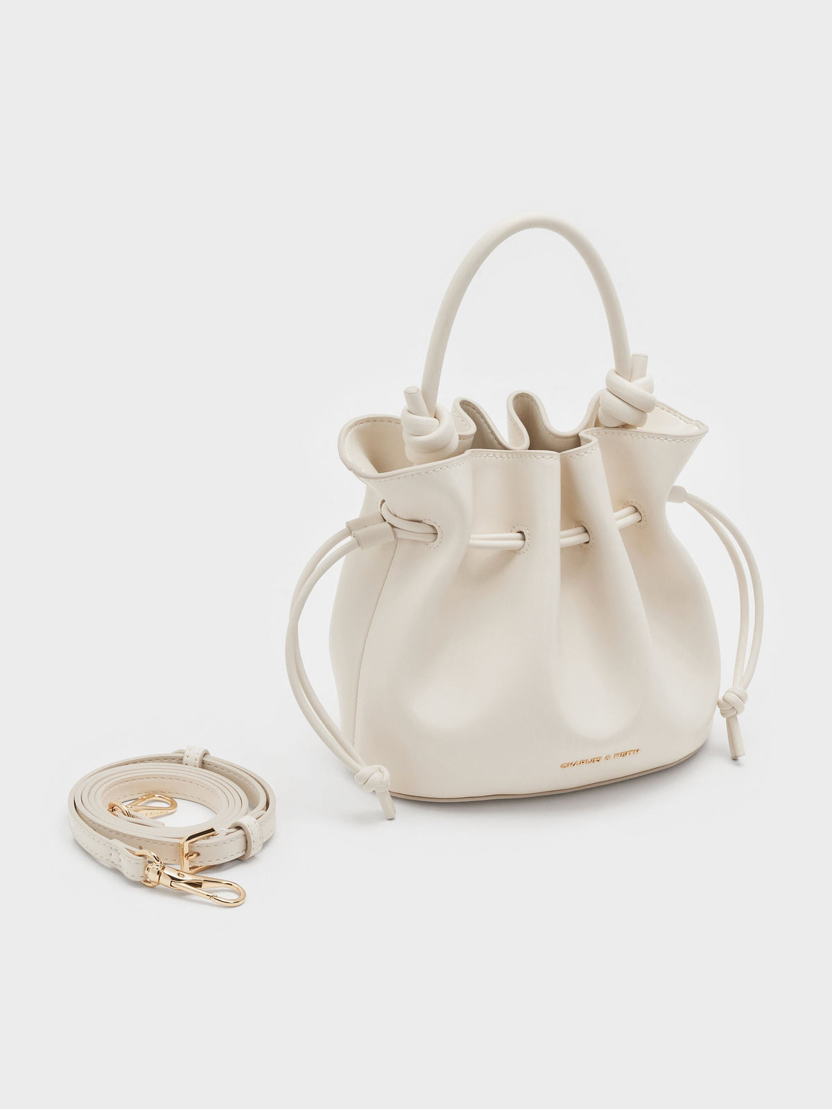 CHARLES & KEITH Customer Favorite / Sammie Drawstring Bucket Bag - Cream